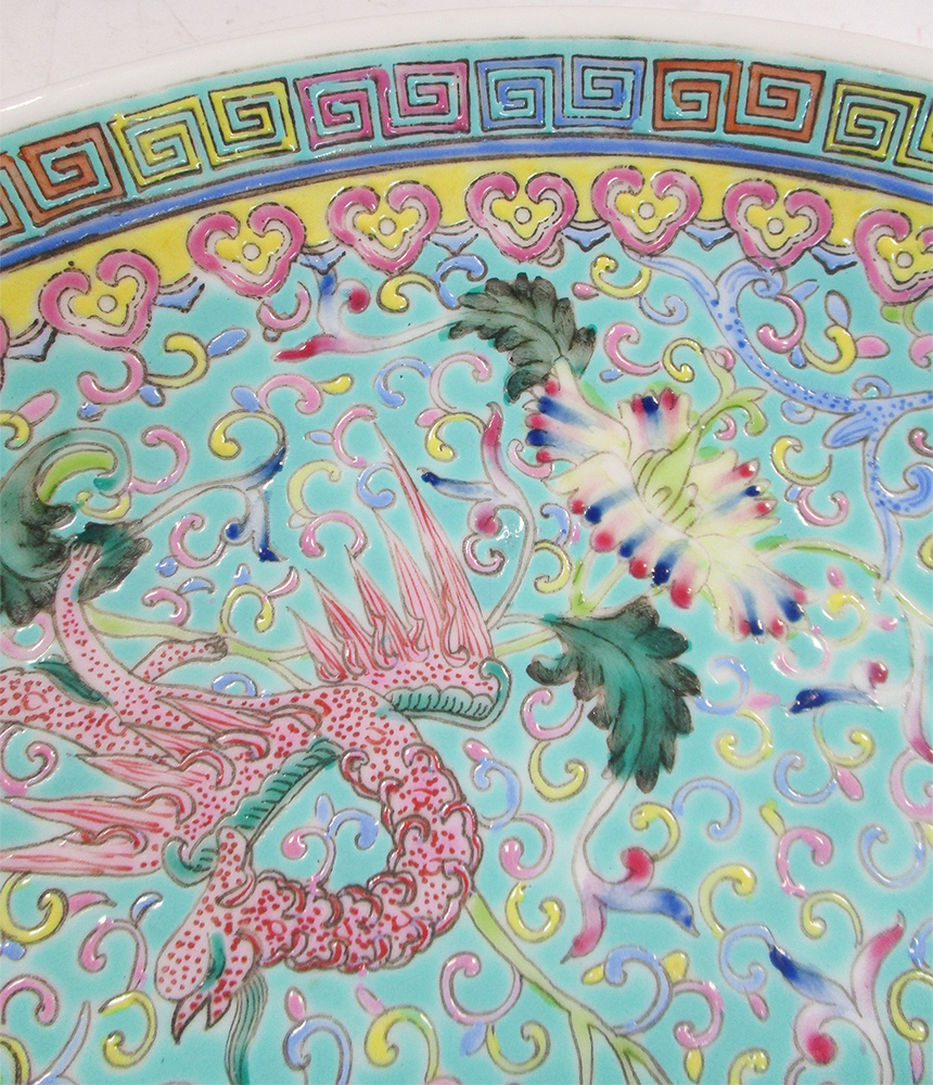 A 20th century turquoise ground dish, the alternating pink and blue dragons radiating about a - Image 4 of 6