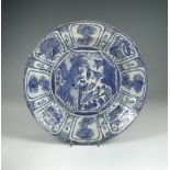 A 16th/17th century Kraak blue and white dish, centrally painted with ducks about a rock amongst