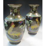 A pair of 20th century black ground cloisonne vases, the waisted necks enamelled with lotus, ruyi