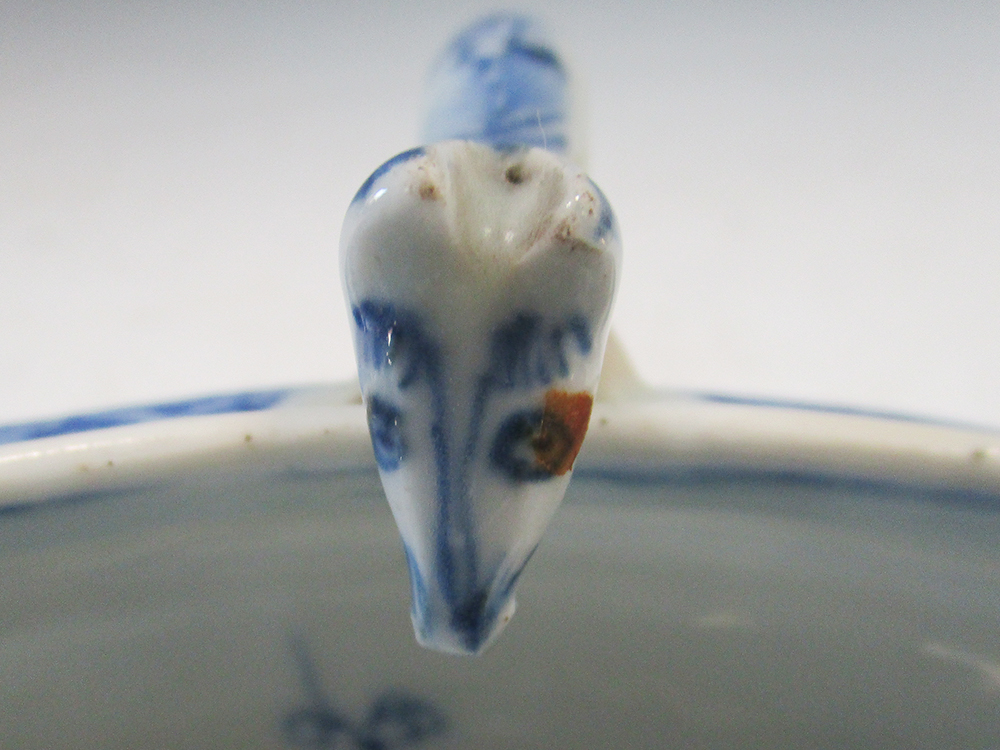 An 18th century blue and white double lipped sauce boat, the head terminals looking into the - Image 3 of 5