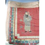 A 19th century red silk over lintel embroidered with the eight Daoist immortals flanked by