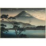 Tsuchiya Koitsu (1870-1949) a woodblock print of Mount Fuji viewed from a pine tree across Lake Sai,