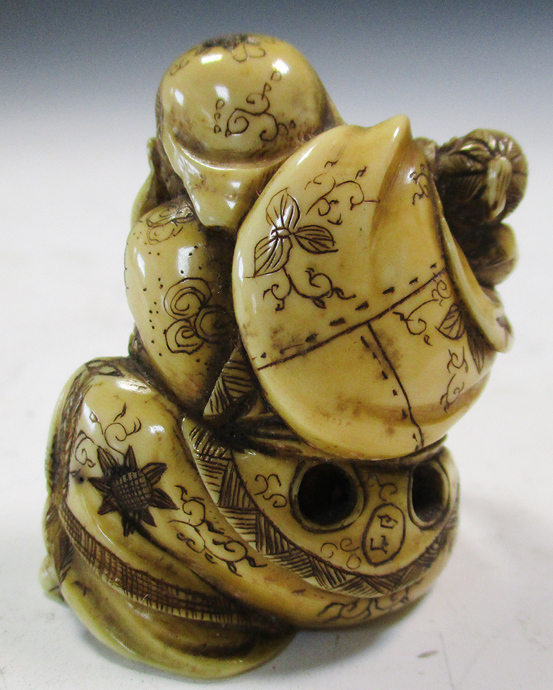 Two late 19th/early 20th century marine ivory netsuke, Ebisu seated with a child in the sack that he - Image 4 of 8