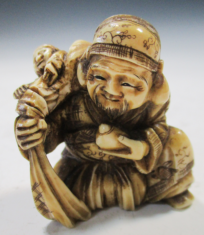 Two late 19th/early 20th century marine ivory netsuke, Ebisu seated with a child in the sack that he - Image 2 of 8