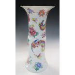 A famille rose gu shaped vase, six character mark of Guangxu, painted in thick enamels with