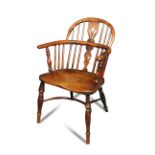 A pair of Yew wood windsor armchairs - early 19th century, with elm saddle seats and on turned