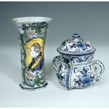 A Delft blue and white posset pot and cover, circa 1700, with scrolled handle and spout, decorated