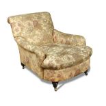 A George Smith Jules type armchair, seat depth 73cm (28ins) 73 x 80cm (28 x 31in) Fabric a liitle