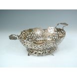 A Dutch Second Standard silver basket, circa 1900, no date letter, with twin floral handles to the