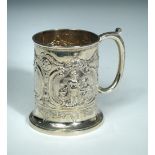 An Edwardian silver christening mug, probably by James Reid & Co, Glasgow 1905, embossed with two