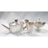 A George III silver teapot, by Andrew Fogelberg and Stephen Gilbert, London 1787 of facetted oval
