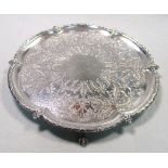 A Victorian silver salver, by Fenton brothers, Sheffield 1883, of shaped circular form, the field