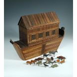 An early 19th century strawwork model ark, with removable upper section and twenty small painted