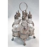 A small George III silver cruet frame, by Thomas Daniell, London 1773, the five bottle frame pierced