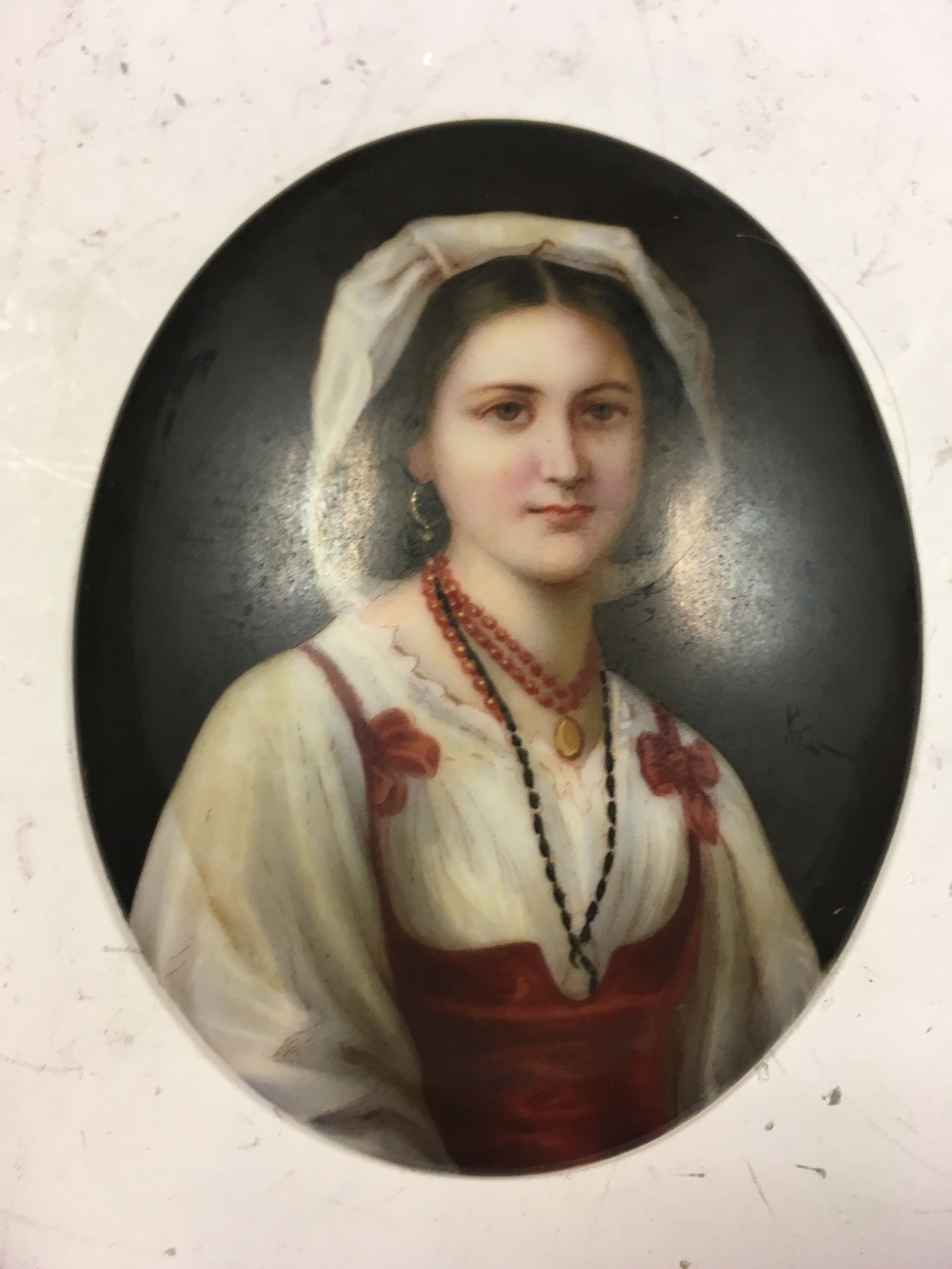 Two 19th century porcelain oval portrait plaques, one painted with a noblewoman with jewelled - Image 4 of 5