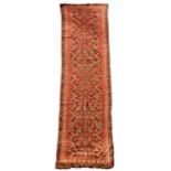 An Afshar runner, circa 1930 392 x 103cm (153 x 40in) A localised area of wear, with wear to the