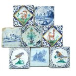 A pair of early maiolica Delft tiles, Middelburg 1520 - 1600, the centres decorated with an elephant