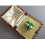 An antique jade and seed pearl four leaf clover brooch by A Vogt, cased by SJ Phillips, each heart