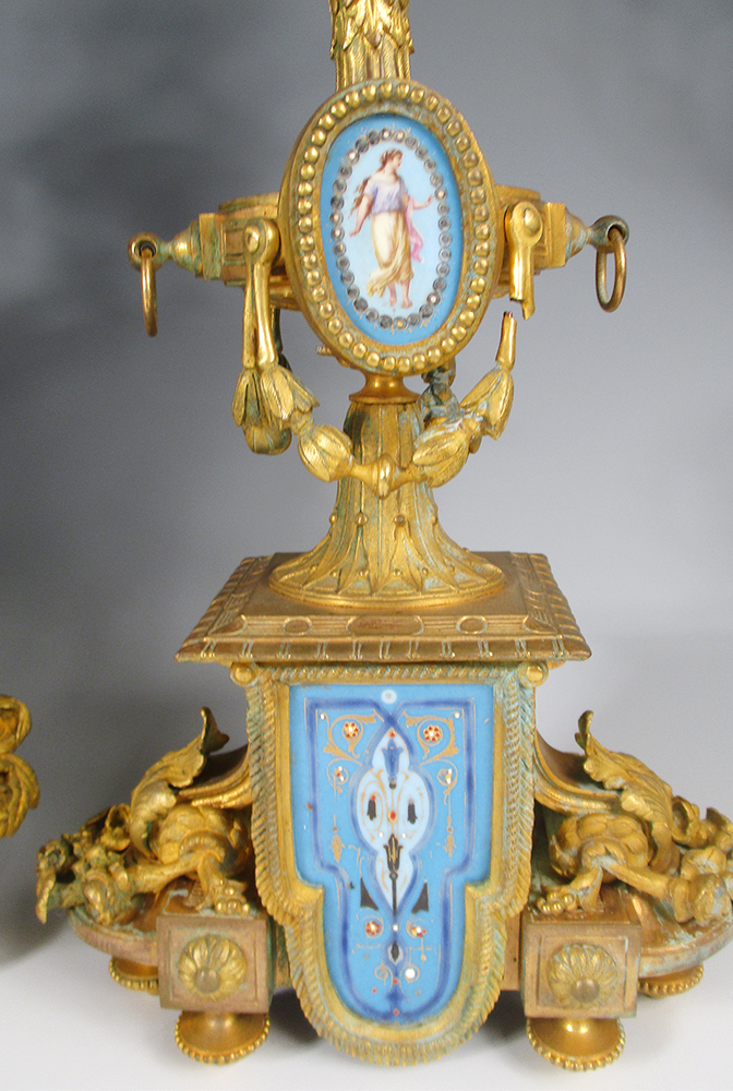 A 19th century French gilt metal and 'Sevres' porcelain clock garniture, the elaborate shaped case - Image 3 of 14