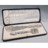 A pair of Victorian silver fish servers, by Henry John Lias & Henry John Lias, London 1856, the