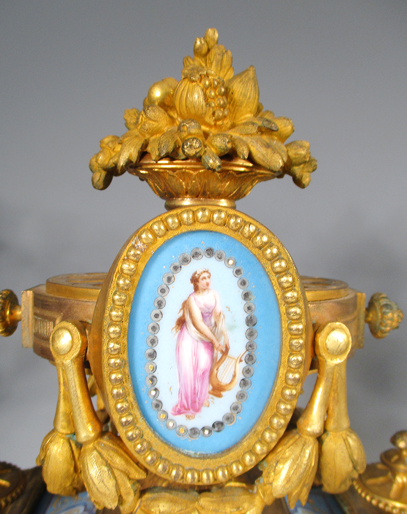 A 19th century French gilt metal and 'Sevres' porcelain clock garniture, the elaborate shaped case - Image 2 of 14