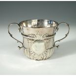 A George I silver porringer, by William Spackman, London 1719, cylindrical with flared moulded