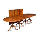 A mid-18th century style walnut pedestal D-end dining table - 20th century, with feather and