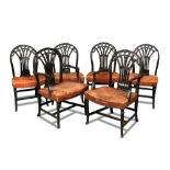 A set of ten mahogany dining chairs in the manner of Hepplewhite - late 19th century, with carved