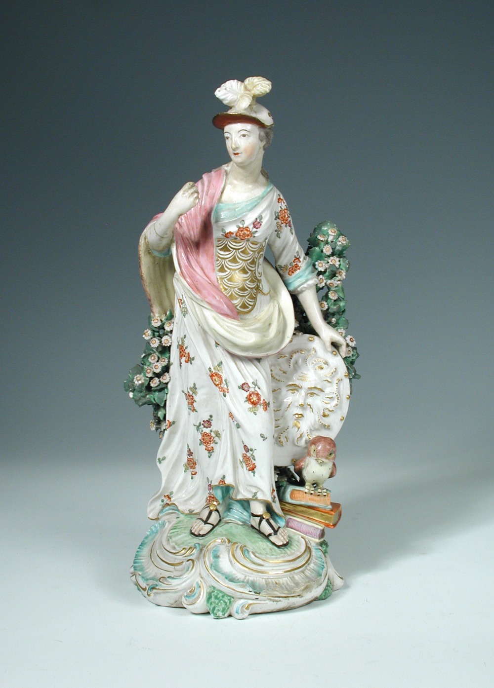 A Derby figure of Minerva, circa 1770, standing in floral dress before bocage and holding a