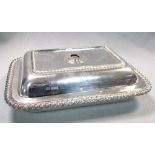 A George V silver entree dish and cover, by the Atkins Brothers, Sheffield 1926, of rectangular