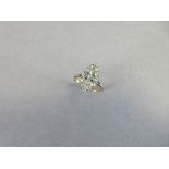 A navette form diamond cluster ring, the shaped plaque close set with fifteen old round, oval and