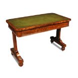 A Regency mahogany library table, with green leather lining, fitted two blind frieze drawers, on