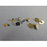 A pair of antique 18ct gold cufflinks together with an onyx and seed pearl part dress set, the
