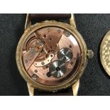 An Omega 9ct gold gentleman's wristwatch with date, no. 17547265, 17 jewel movement, adjusted two