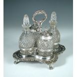 A George III silver cruet frame, by Thomas and James Creswick, Sheffield 1818, the shaped