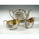 A matched George III Scottish silver four piece tea set, by James McKay, comprising a teapot,