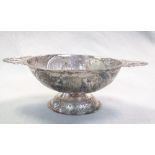 A 19th century Dutch silver brandy bowl, of oval pedestal form, the body embossed and chased with