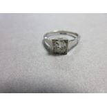 An oval cut diamond single stone ring, the old cut oval brilliant diamond claw set in a square