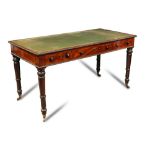 A Regency mahogany library table, green leather lined top, three frieze drawers and dummy verso with