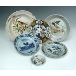 A group of 18th century and later Delft plates, to include two polychrome plates decorated to the