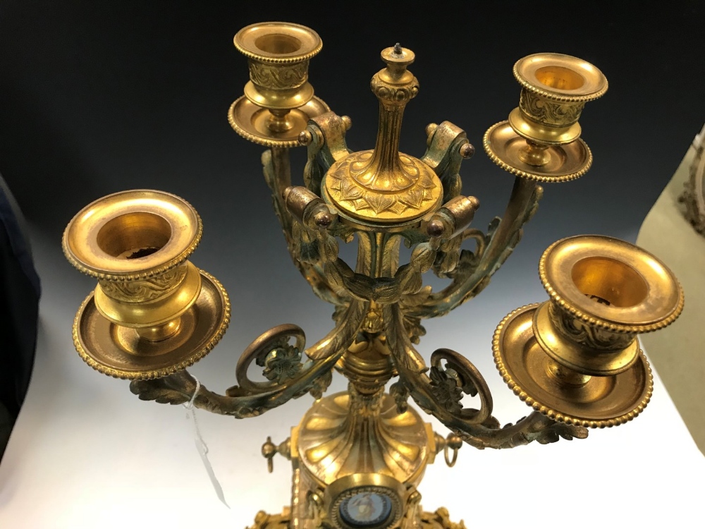 A 19th century French gilt metal and 'Sevres' porcelain clock garniture, the elaborate shaped case - Image 14 of 14