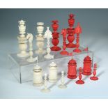 An Indian ivory chess set, Vizagapatam, circa 1830, one side stained red, the other side left