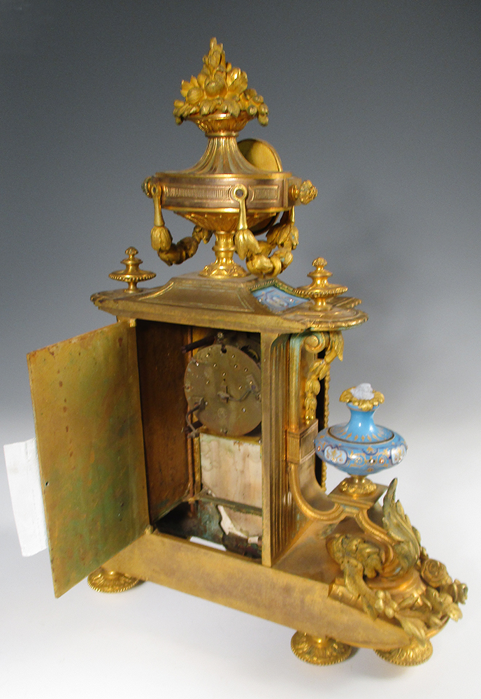 A 19th century French gilt metal and 'Sevres' porcelain clock garniture, the elaborate shaped case - Image 6 of 14