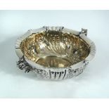 A Victorian silver two handled oval bowl, by Charles Stuart Harris, London 1885, decorated overall