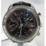 A gentleman's Omega Speedmaster Automatic wristwatch, the black dial with silvered baton numerals,