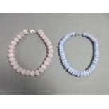A rose quartz bead necklace and a similar blue lace agate necklace, the first composed of twenty-