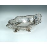 A George V shaped oval silver basket, by David Fullerton, London 1928, the shaped sides