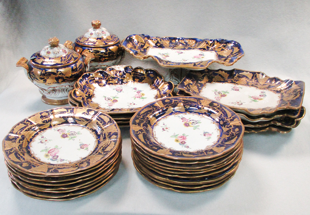 A 19th century Mason's ironstone dessert service, the moulded bodies painted to the centres with