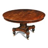 A Regency mahogany pedestal breakfast table in the manner of Gillow, the tapering panelled column