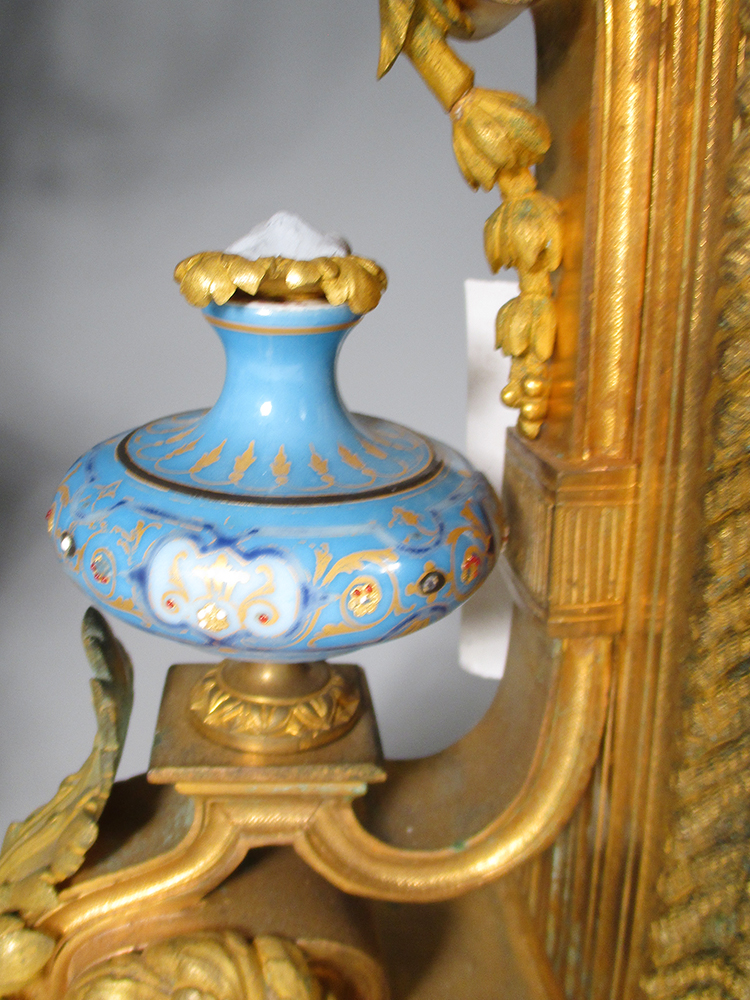 A 19th century French gilt metal and 'Sevres' porcelain clock garniture, the elaborate shaped case - Image 4 of 14
